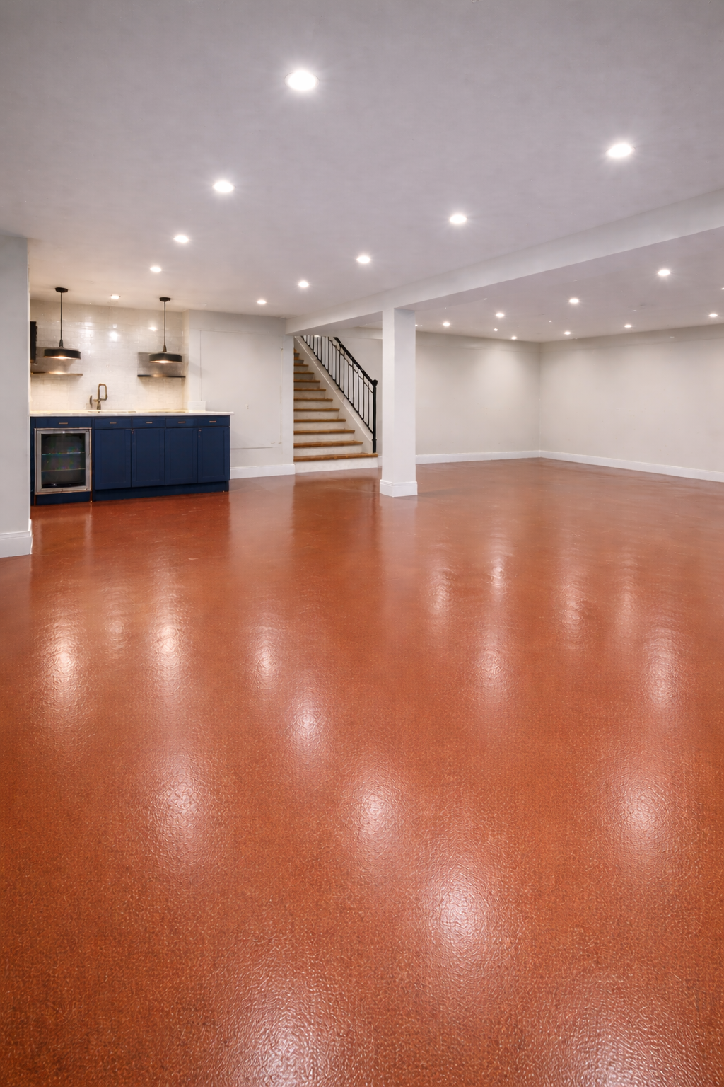 Solid colour epoxy basement floor installed by IronRock Concrete Coatings in the Okanagan