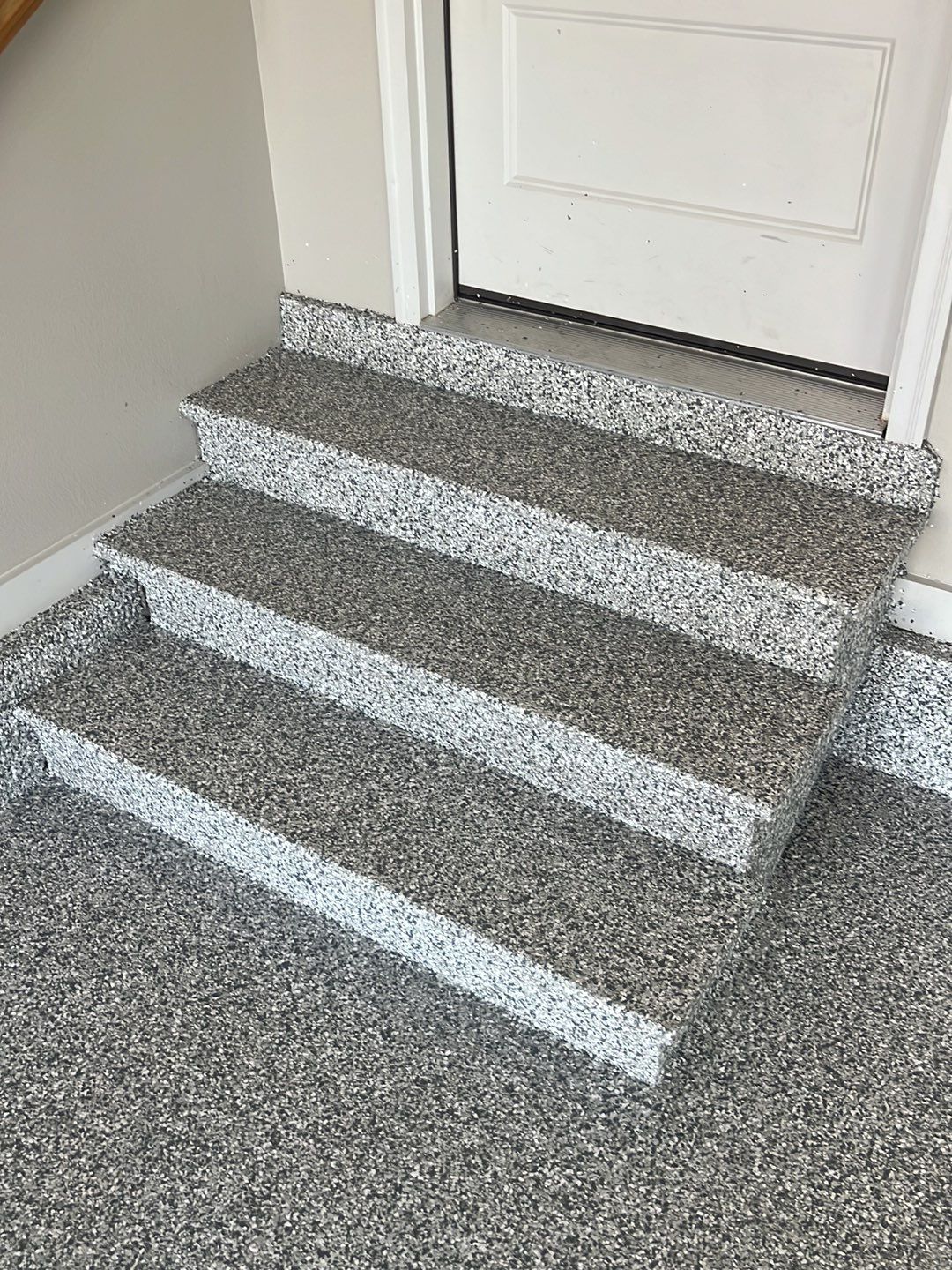 Epoxy flake coating applied to concrete entry steps