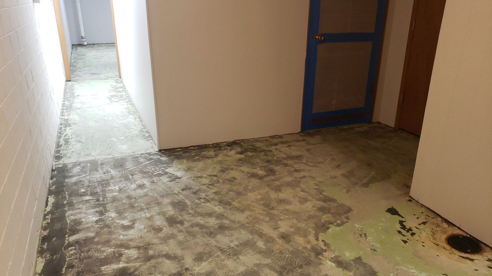 Before the project: Commercial office interior in Kelowna by IronRock flake flooring