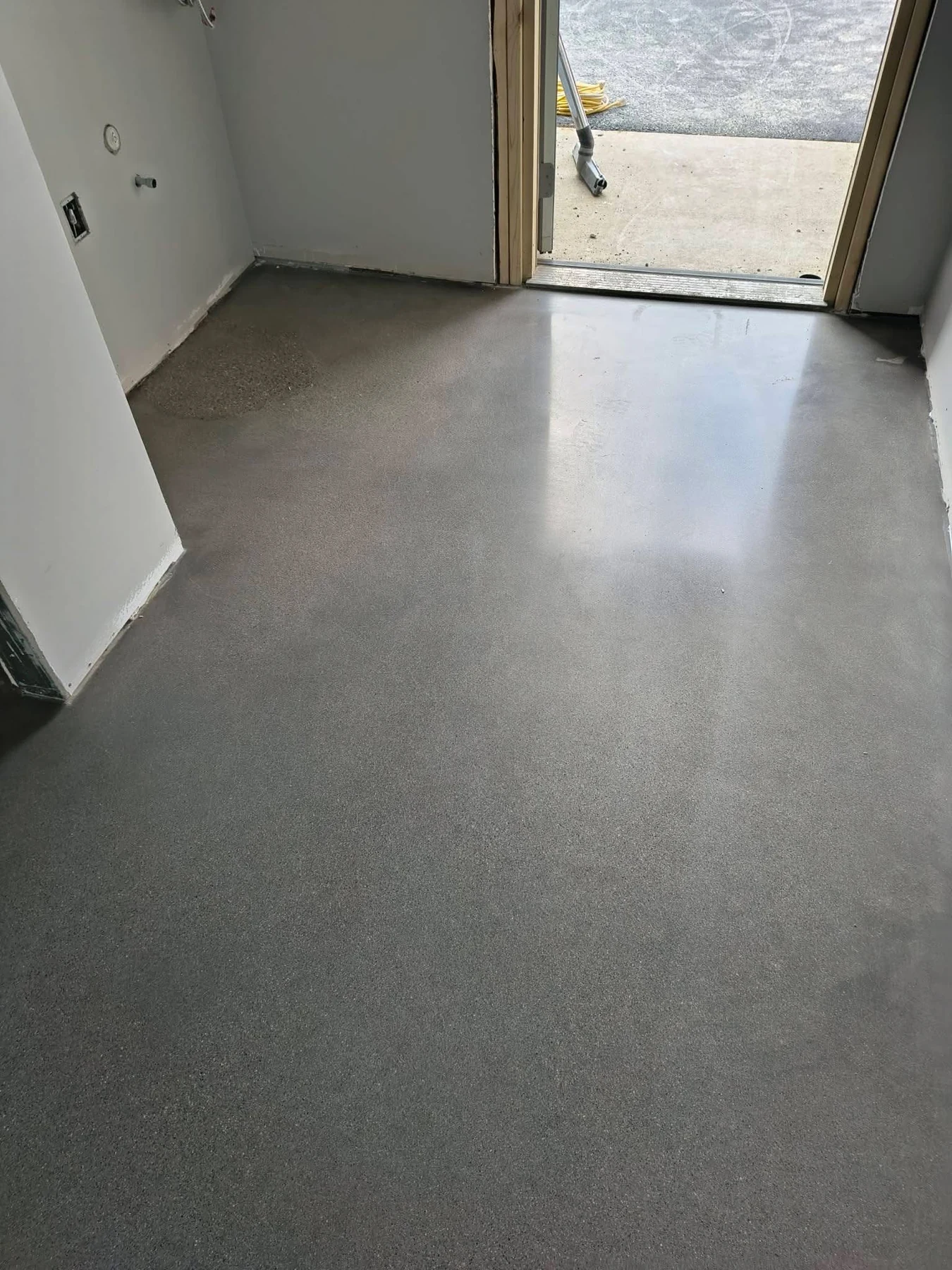 Polished concrete floor by IronRock during an interior renovation