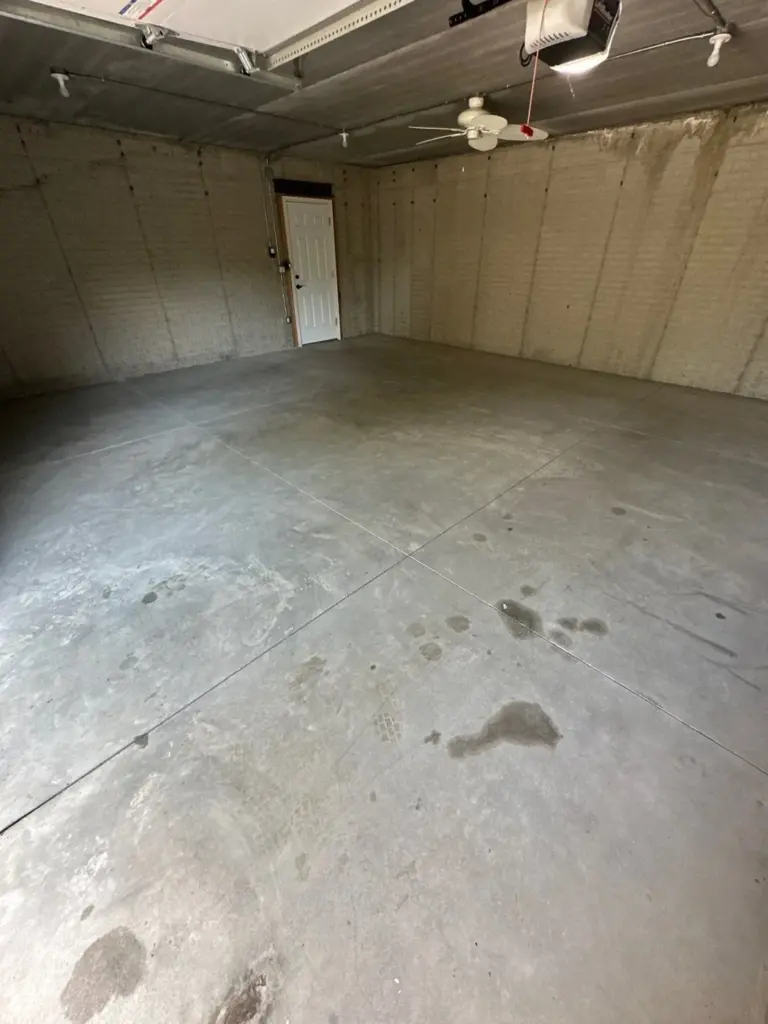 Before the project: Finished commercial flake floor by IronRock
