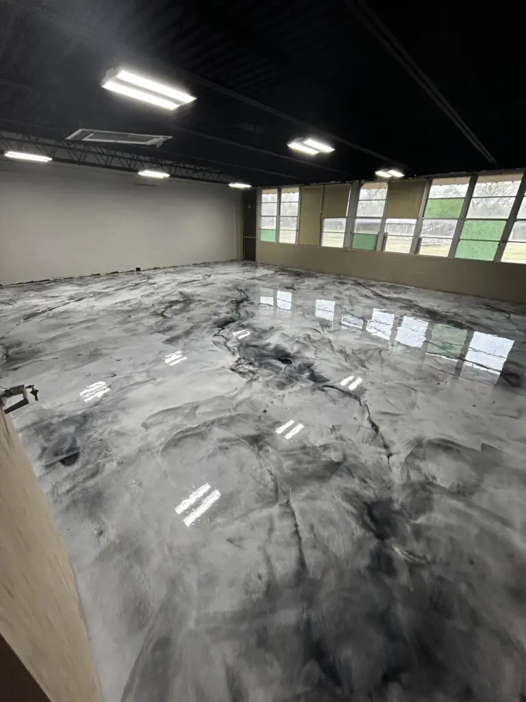 Finished commercial metallic epoxy floor by IronRock