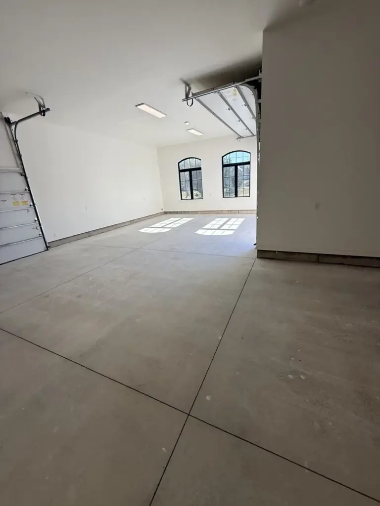 Before the project: Finished commercial metallic epoxy floor by IronRock
