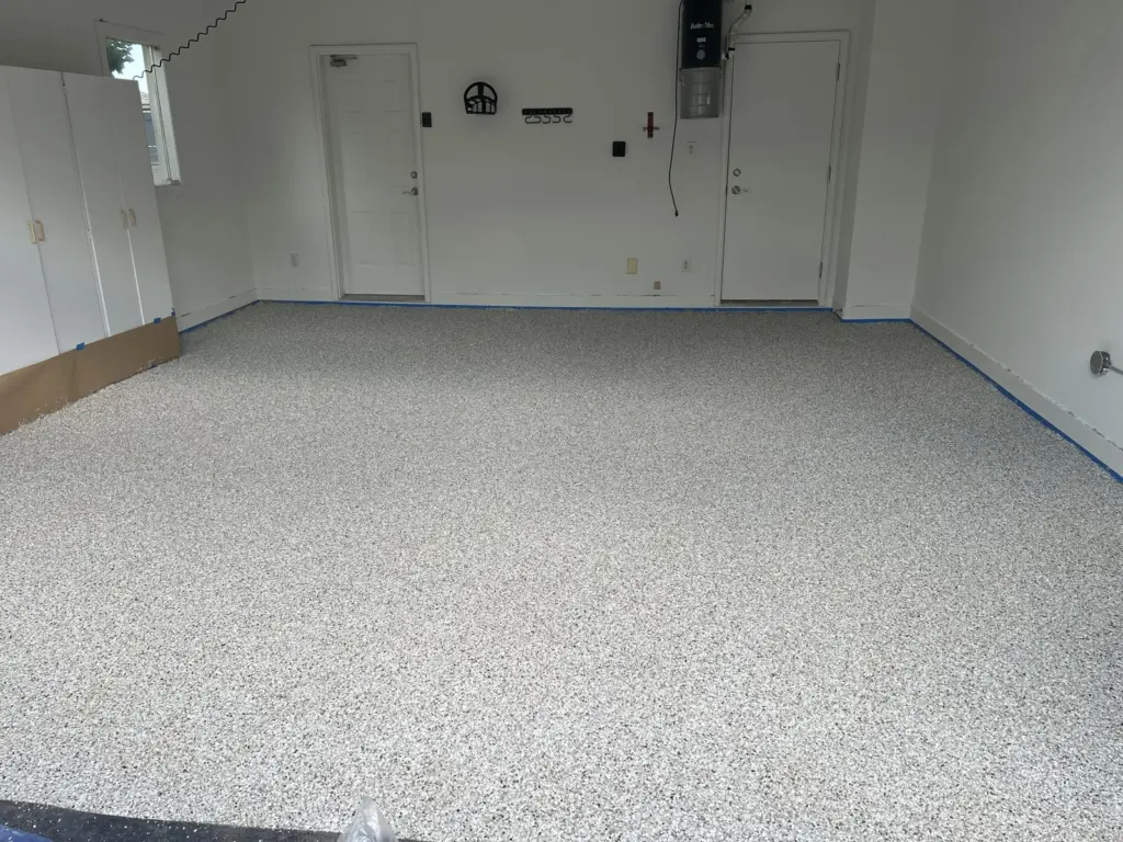 Coyote flake garage floor installed by IronRock