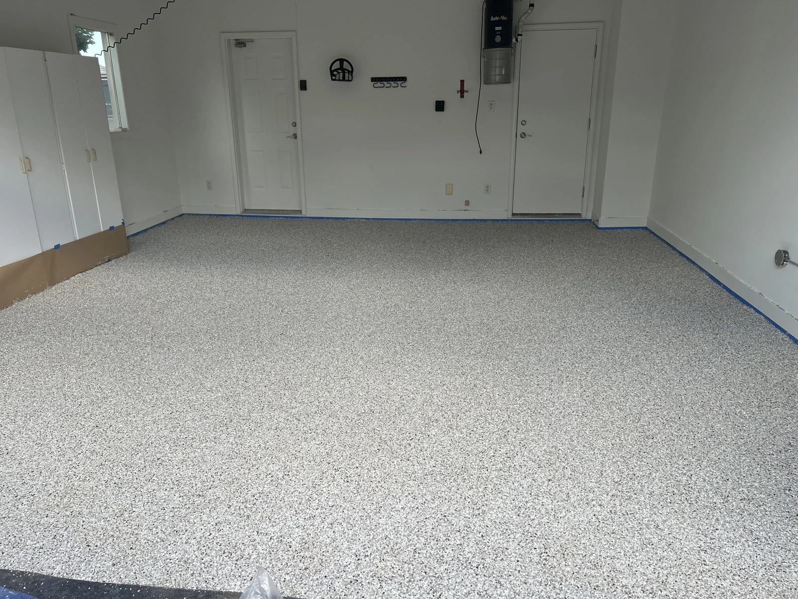Coyote flake garage floor installed by IronRock