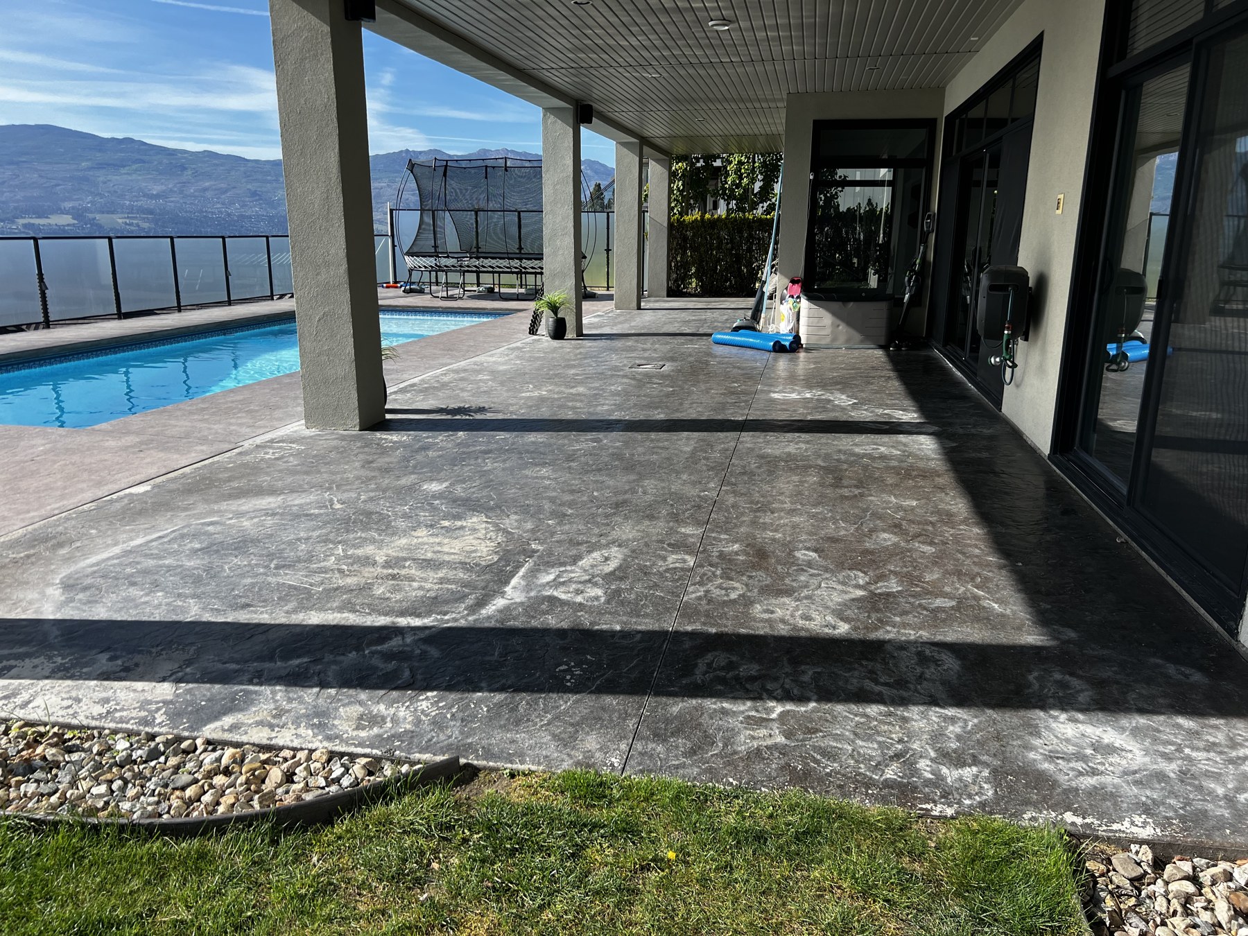 Before the project: Concrete recolouring on George’s back patio